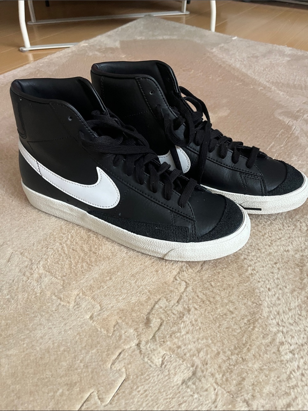Nike Black and White High-Top Swoosh Sneakers